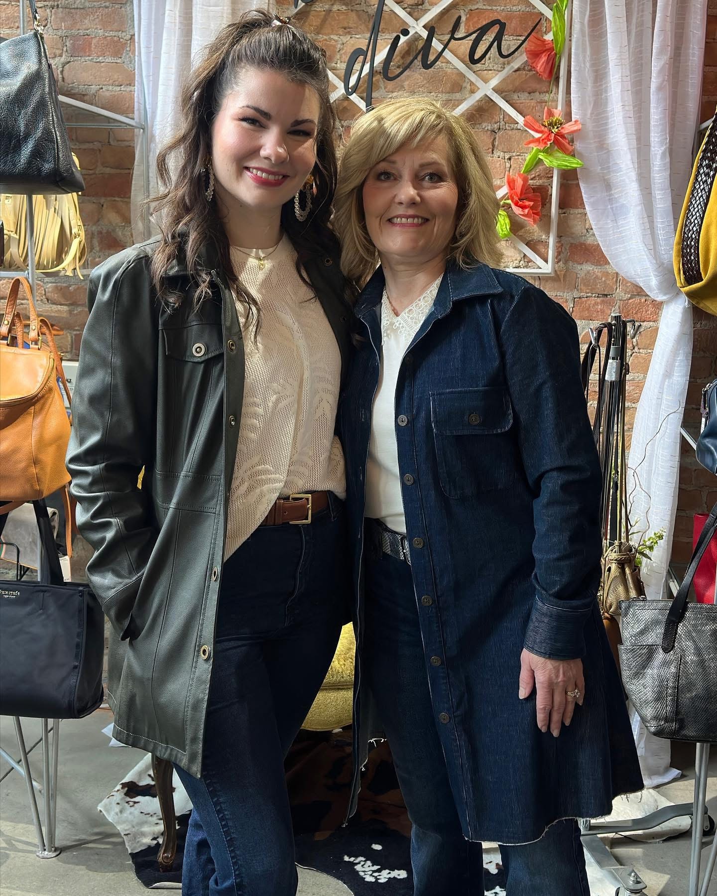 Two women in leather and denim jackets at Twice Blessed boutique