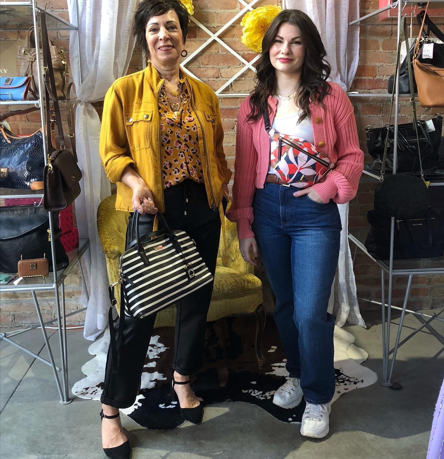 Mother and daughter in yellow jacket and pink cardigan at Twice Blessed boutique
