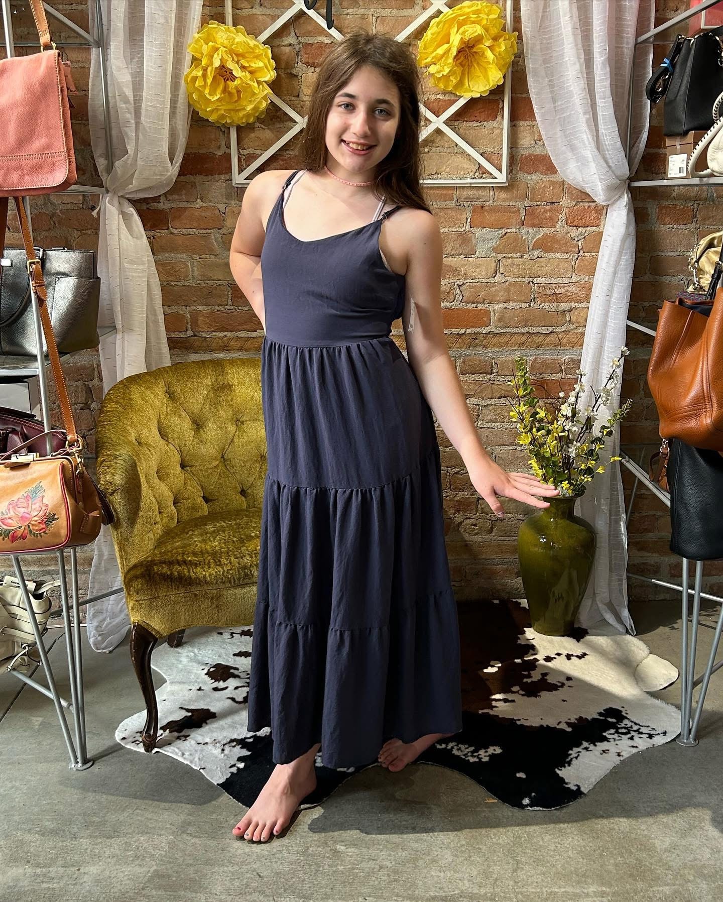 Girl in navy tiered maxi dress at Twice Blessed boutique