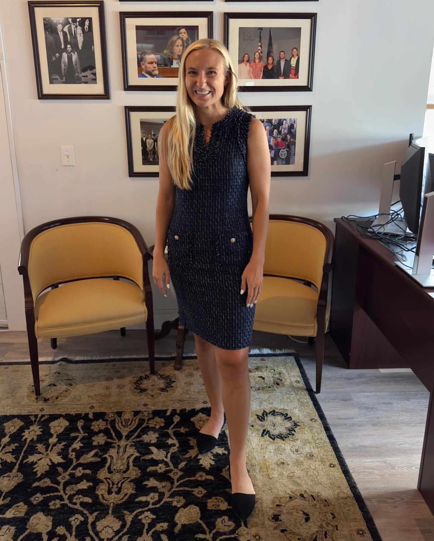 Woman in navy tweed sheath dress with gold buttons at Twice Blessed boutique