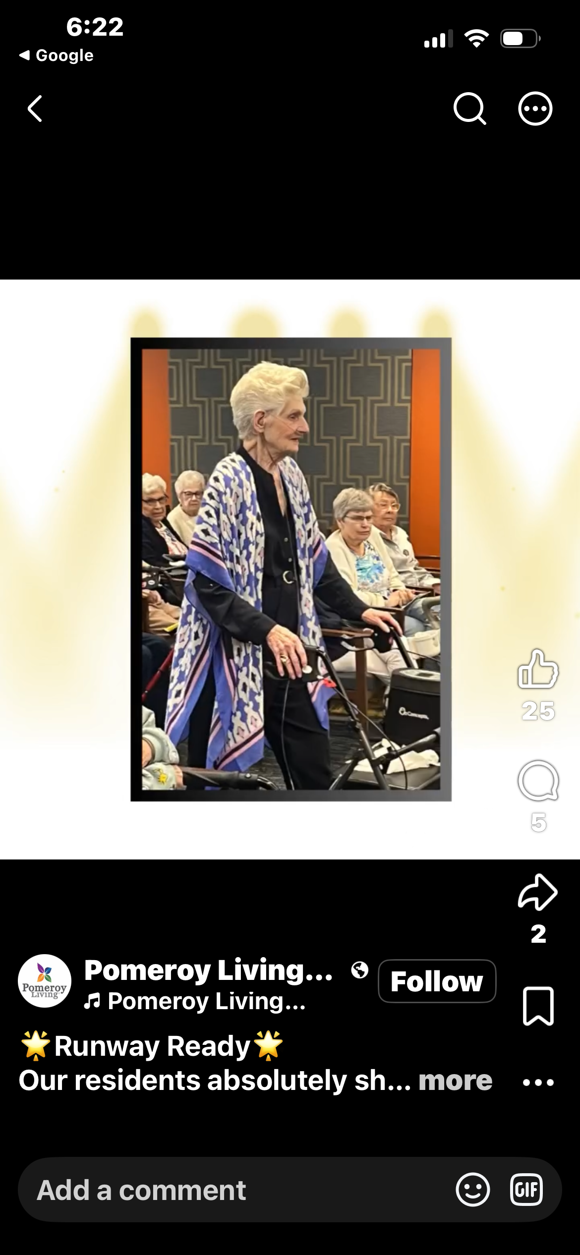 Pomeroy Living resident in a blue patterned kimono walking the runway at the Senior Fashion Show