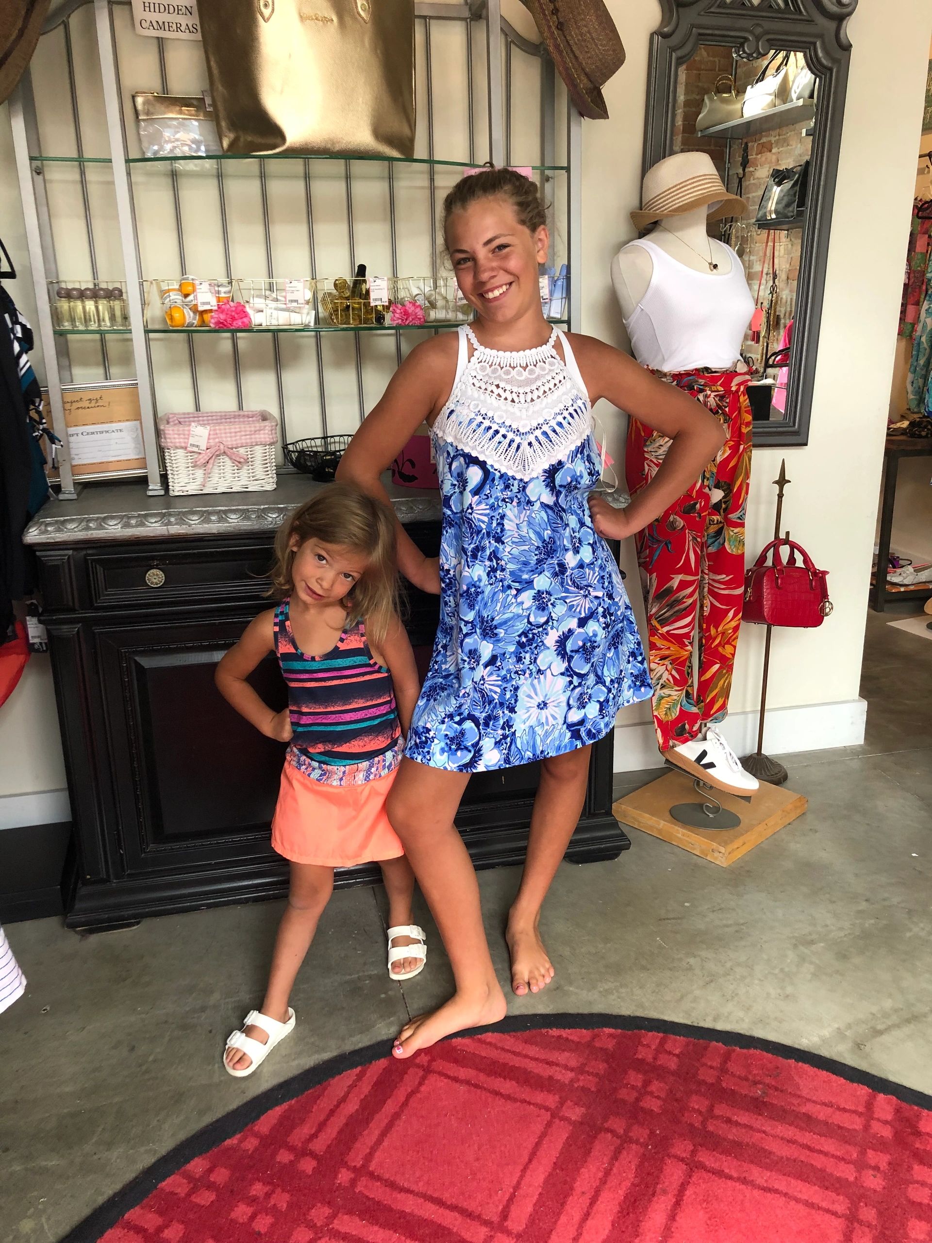 Woman and girl in colorful summer dresses